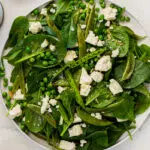 Warm Spinach Salad with Feta and Peas