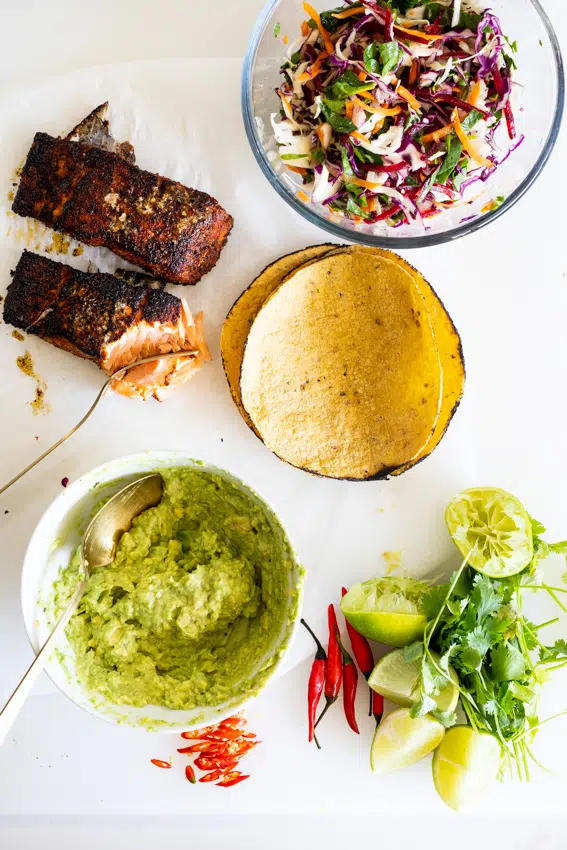 Blackened Salmon Tacos with Smashed Avocado and slaw