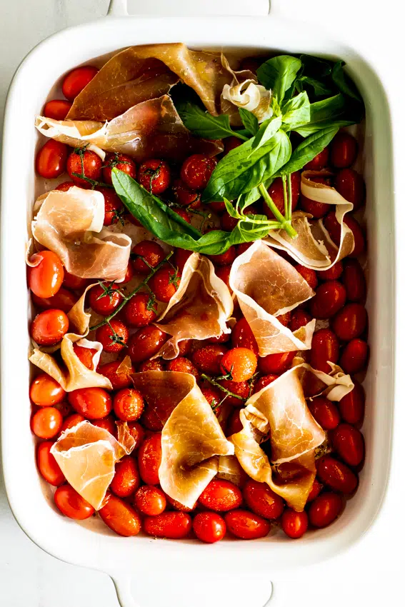 Cherry tomatoes, prosciutto and basil.