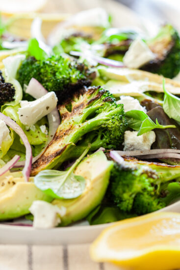 Broccoli salad with goat's cheese, avocado and red onion.