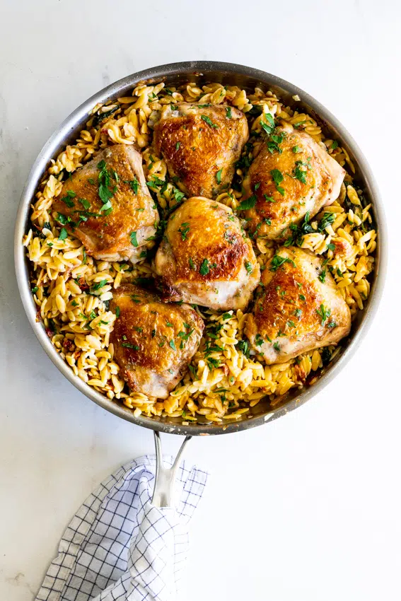 Tomato Spinach Orzo Pasta with Crispy Chicken Thighs