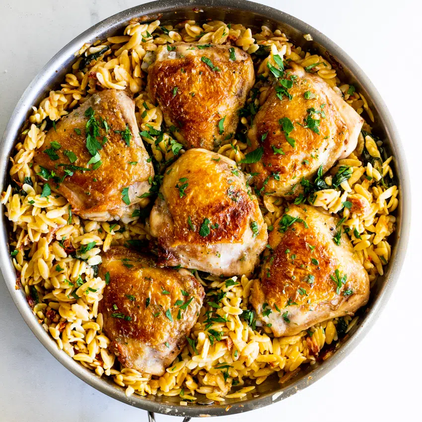 Tomato Spinach Orzo Pasta with Crispy Chicken Thighs