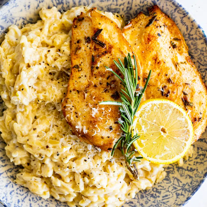 Cacio e pepe orzo with lemon rosemary chicken