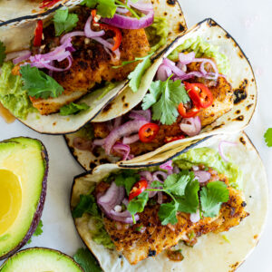 Pan seared fish tacos with smashed avocado