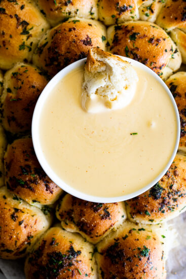 Garlic butter bread wreath with fondue dip