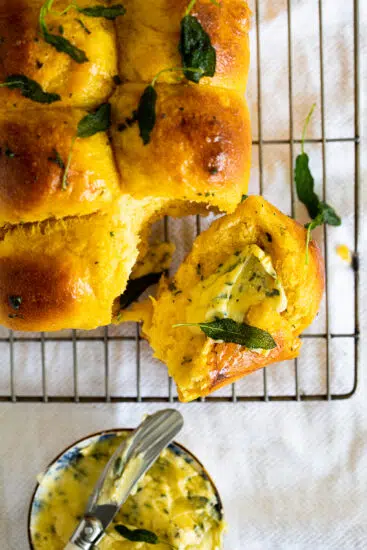 Soft Pumpkin Dinner Rolls with Sage Butter