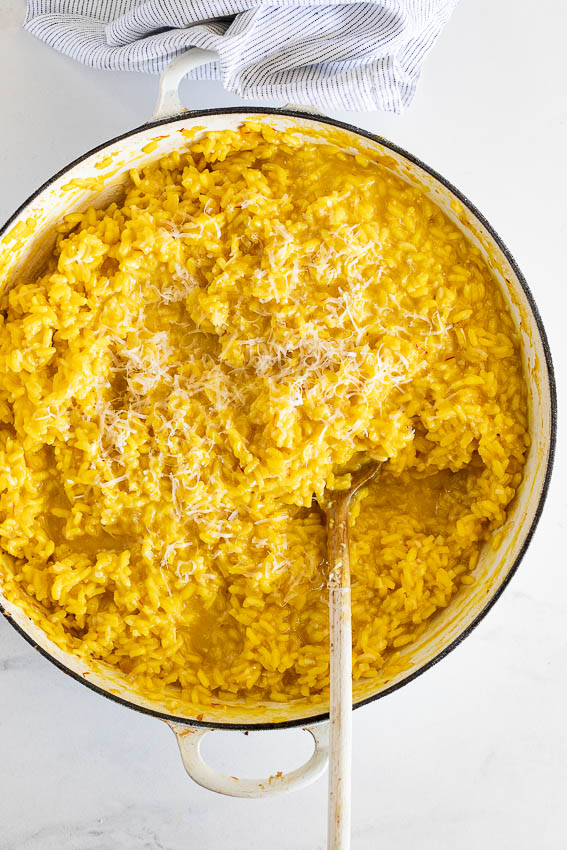 Creamy risotto Milanese flavored with saffron and Parmesan cheese.