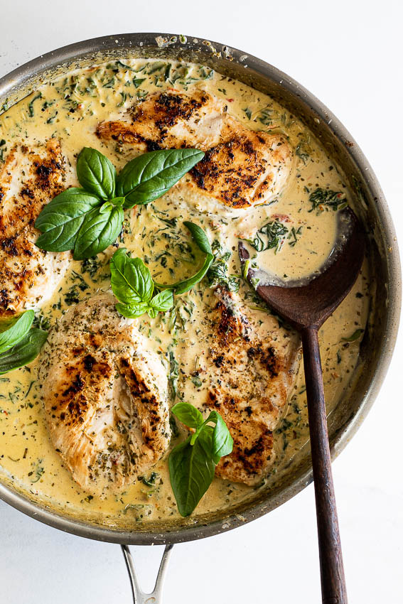 Chicken breasts in creamy spinach and sun-dried tomato sauce.