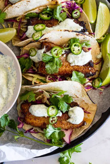 Pork belly tacos with cabbage and spicy sauce