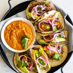Slow-braised Short Rib Tacos with pickled red onion