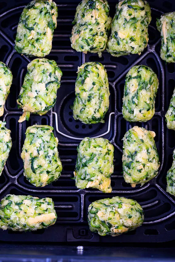 Zucchini Tots in air fryer basket