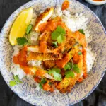 Garam masala chicken schnitzel with butter chicken sauce