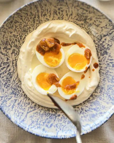 Spicy butter drizzled over Turkish eggs.