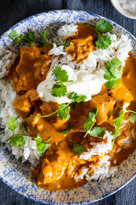 Slow cooker butter chicken with rice.