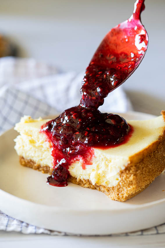 Creamy Air Fryer Cheesecake with berry sauce