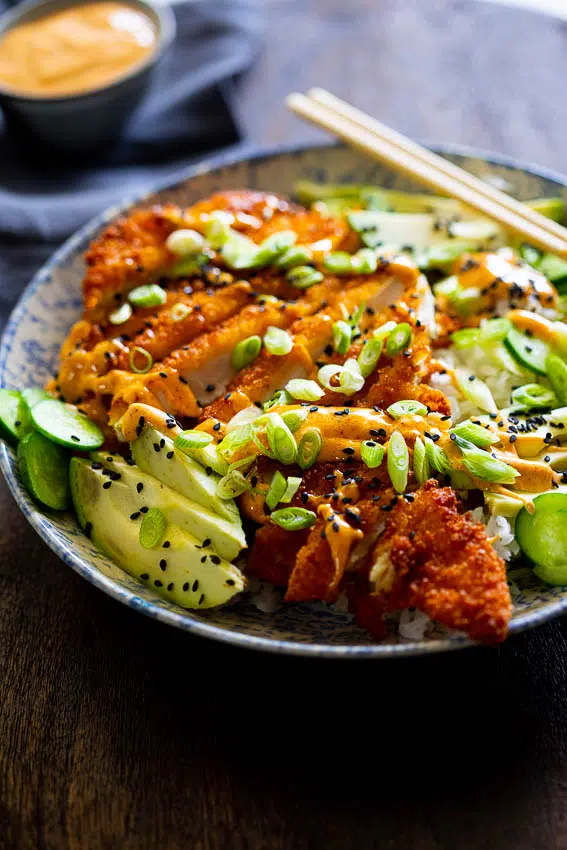 Easy Chicken Katsu Bowls with rice, avocado, cucumber and spicy curry mayo