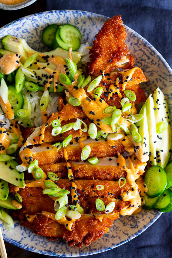Easy Chicken Katsu Bowls with rice, avocado, cucumber and spicy curry mayo