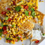 Pan seared fish with charred corn salad