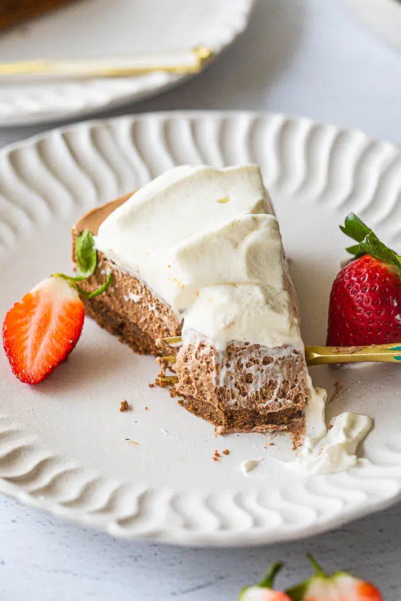 Chocolate mousse pie with whipped cream.