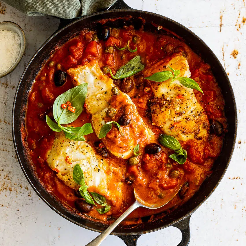 Seared fish in Puttanesca sauce