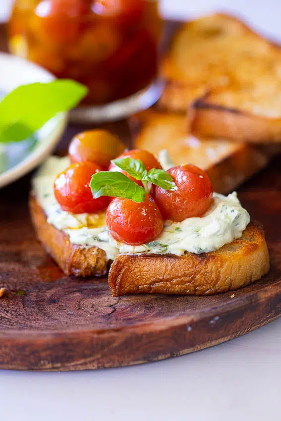 Marinated tomatoes with whipped ricotta on toast