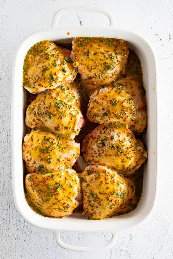 Chicken thighs in honey mustard chicken marinade.