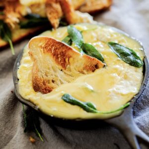 Brie baked with honey and sage.
