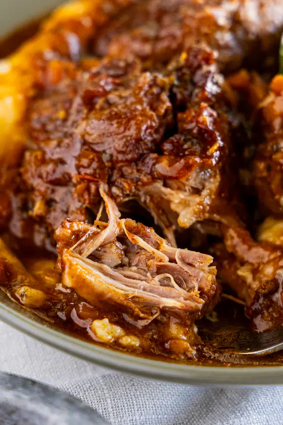 Pull-apart tender slow braised oxtail with mashed potatoes