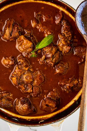 Slow Braised Oxtail in large pot.