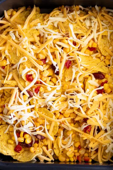 Air Fryer Nachos topped with cheese.