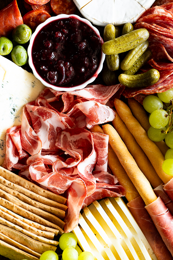 Charcuterie, crackers, cheese and preserves.