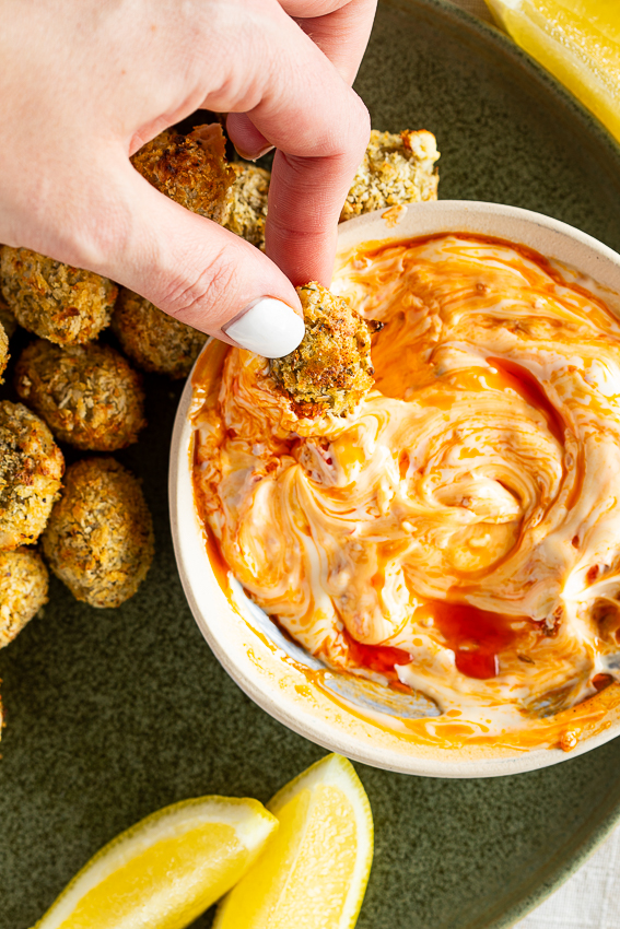 Easy Stuffed Olives serve with Calabrian chili dip.