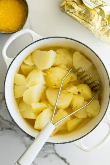 Cooked potatoes mashed.