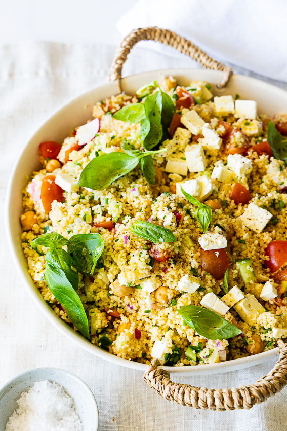 Easy couscous salad with cucumber, tomato, feta cheese and herbs.