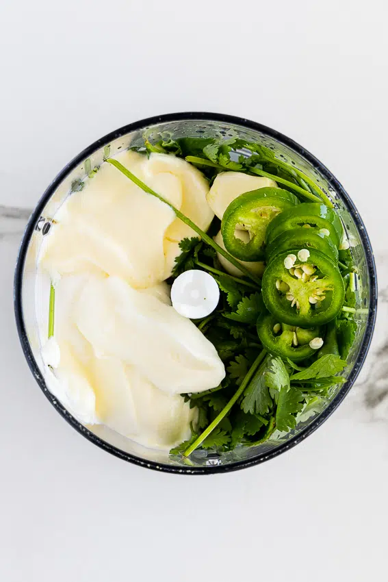 Ingredients for cilantro sauce in blender.