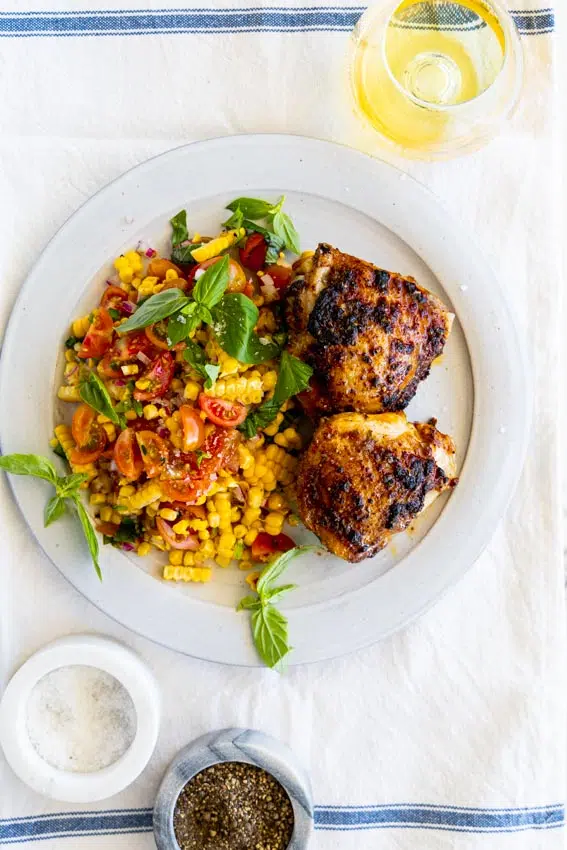 Air fried chicken thighs with corn salad.