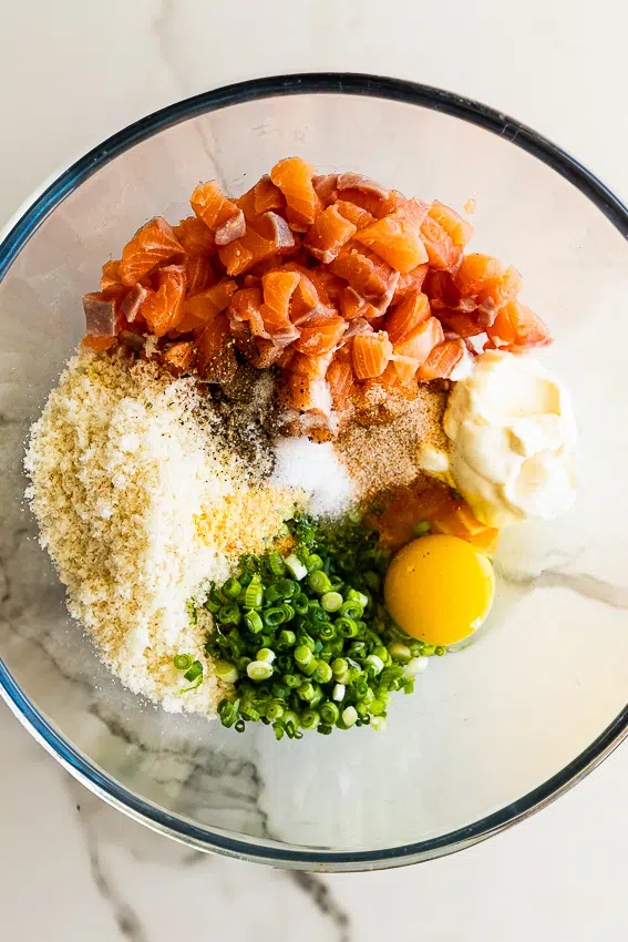 Ingredients for salmon cakes in mixing bowl