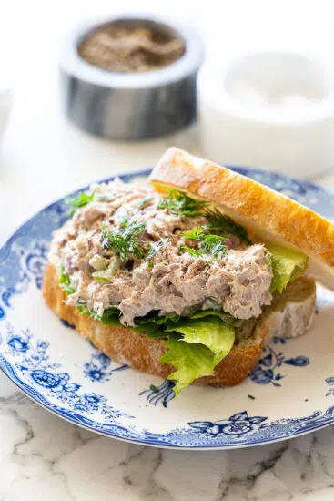 The most delicious, easy tuna salad recipe served on crusty bread as a sandwich.