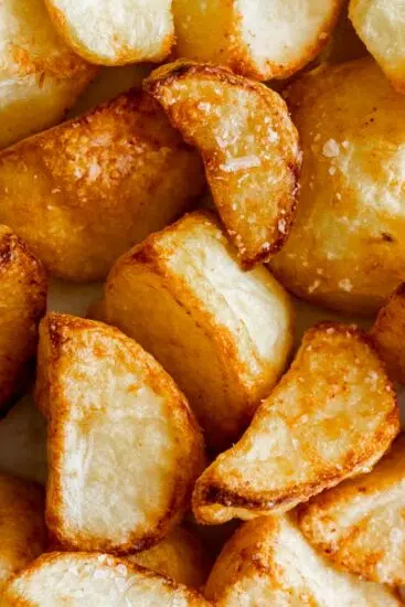 Crispy roast potatoes cooked in the air fryer.