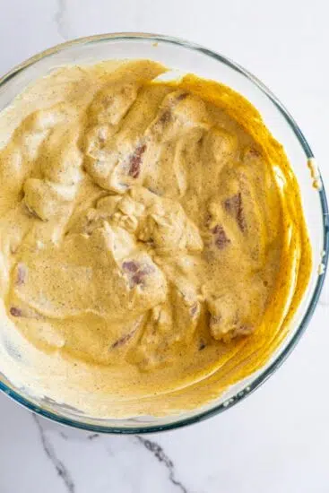 Chicken thighs in korma marinade