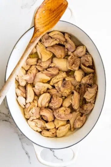 Browned chicken in pot