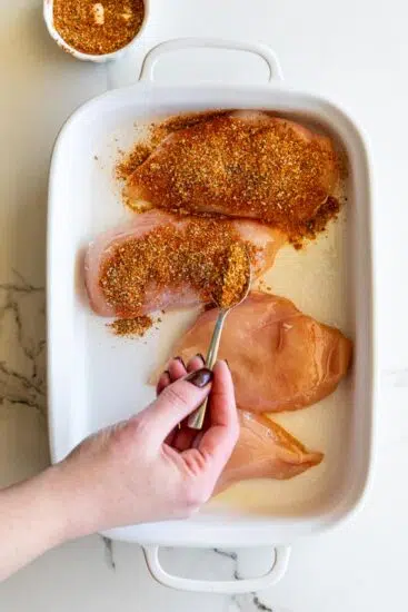 Chicken breasts seasoned with seasoning mix.
