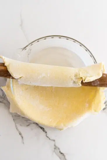 Pie dough rolled into pie plate.