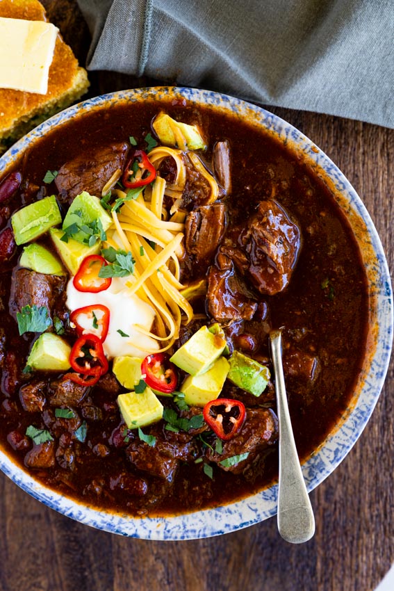 Beef Chili served with sour cream, cheese and avocado
