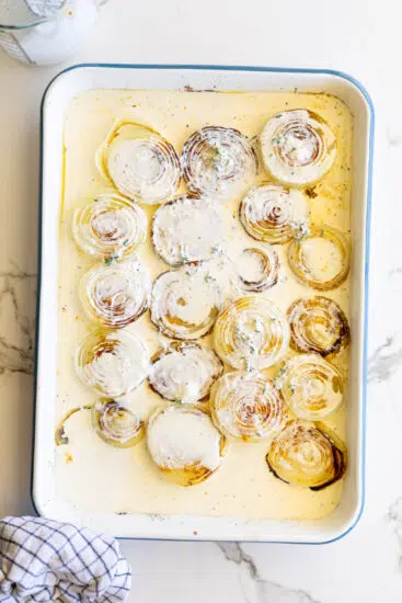 Baked onions with parmesan cream sauce.