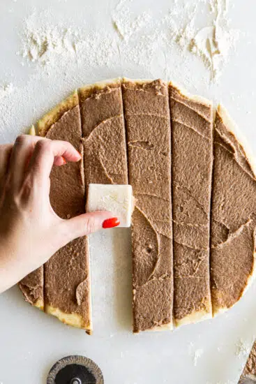 Cinnamon rolls cut and rolled.