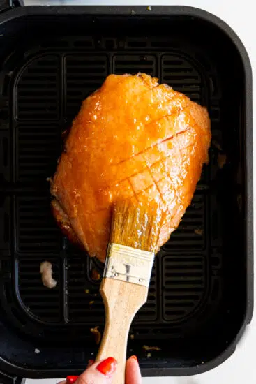 Instant Pot Gammon glazed with peach glaze.