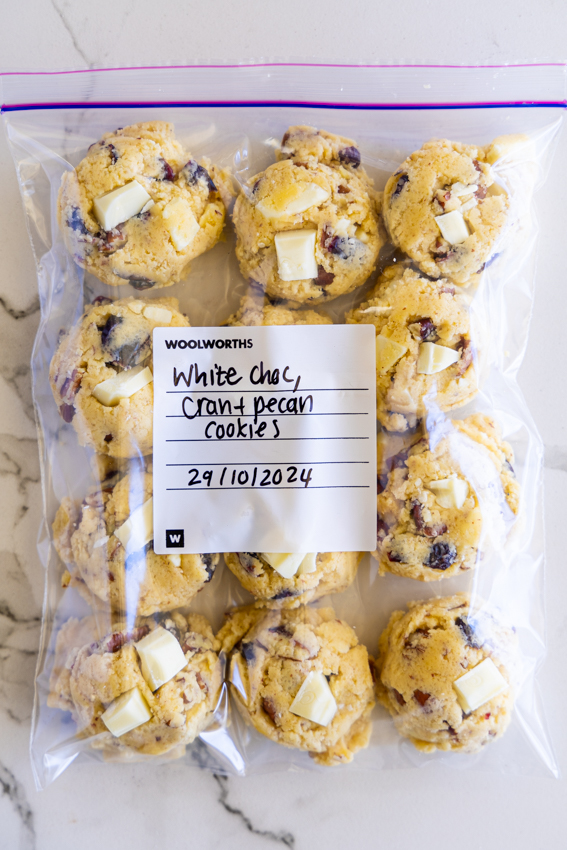 White chocolate cranberry cookie dough in freezer bag.