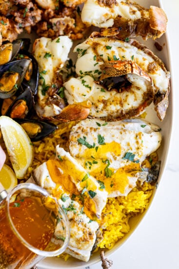 Garlic butter poured over grilled fish.