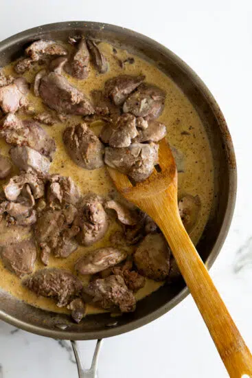 Chicken livers cooked in creamy sauce.